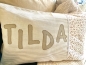 Preview: Namenskissen Westfalenstoffe taupe mit Blumenwiese